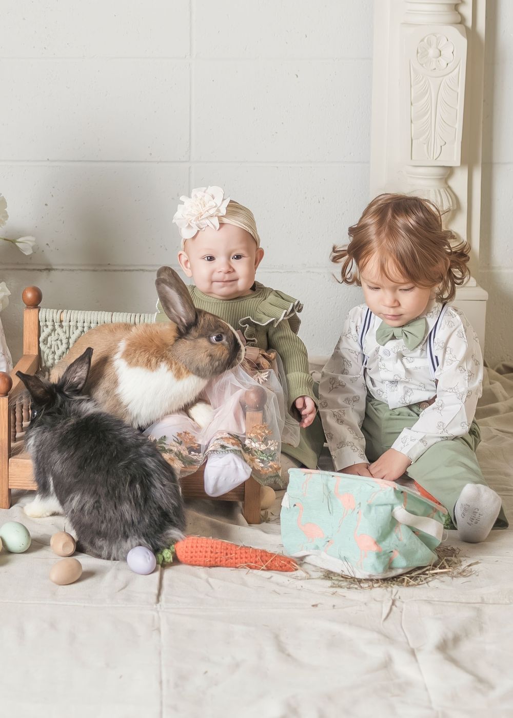 Small child sits on floor playing with a fluffy cat in a series of connected photos showing their interaction.