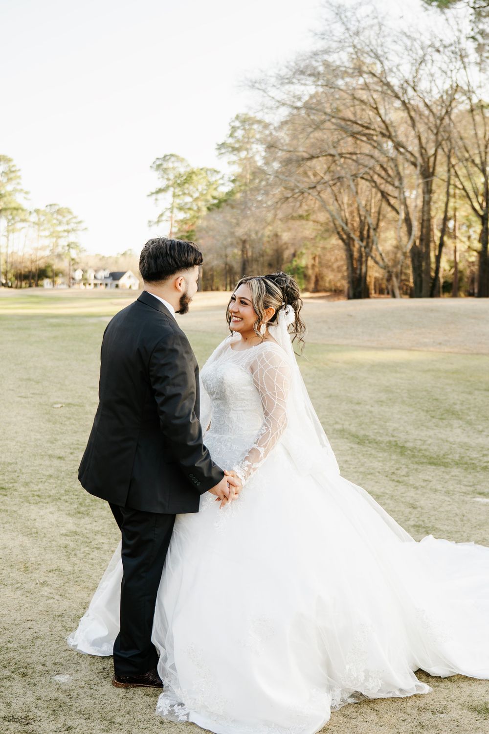 River Landing Clubhouse wedding in Wallace NC with elegant views and romantic moments captured by AKL Photo & Films. Golf Course & lake View