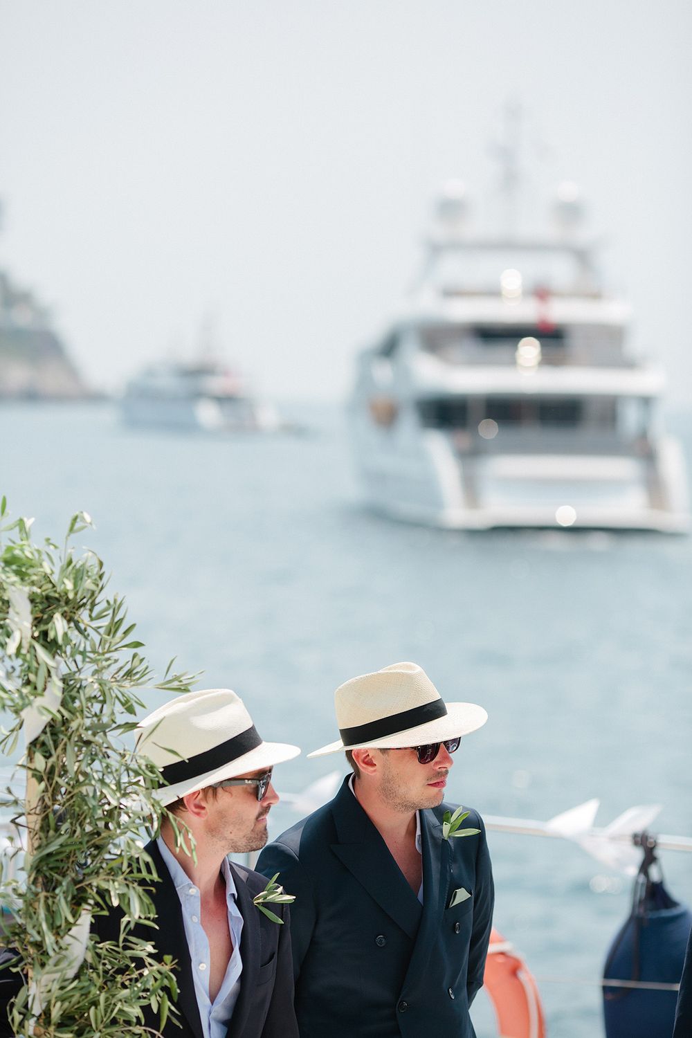 Guests celebrating a yacht wedding on the French Riviera coastline