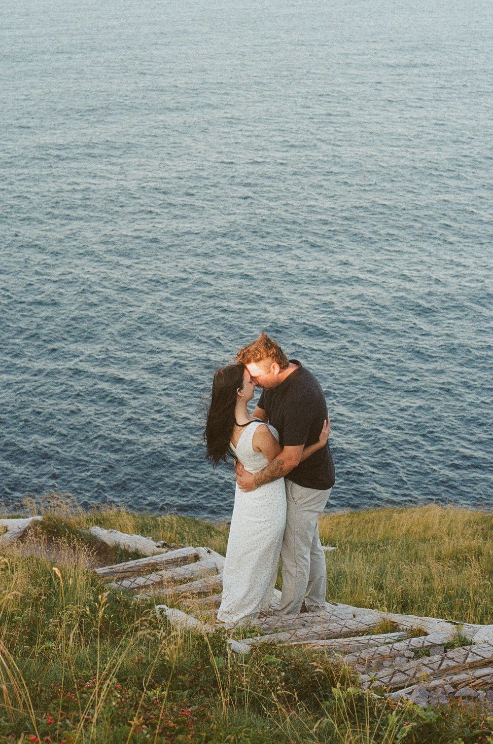 Candid engagement photos on the East Coast Trail by Newfoundland documentary style digital and film photographer Kaitlyn Yvette.