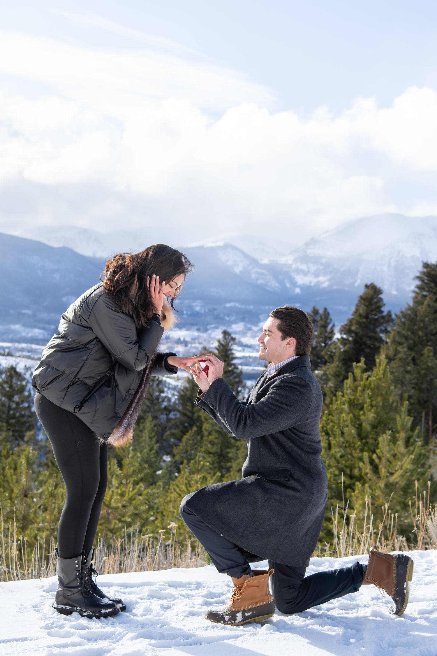 Romantic winter proposal at Sapphire Point near Breckenridge Colorado for engagement photo session.