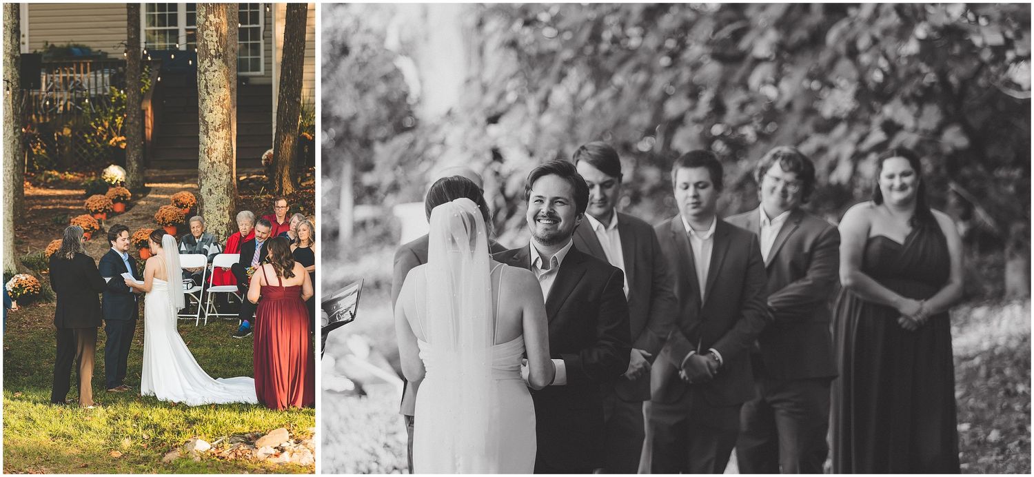 Wedding party members stand together in formal attire during an outdoor celebration.