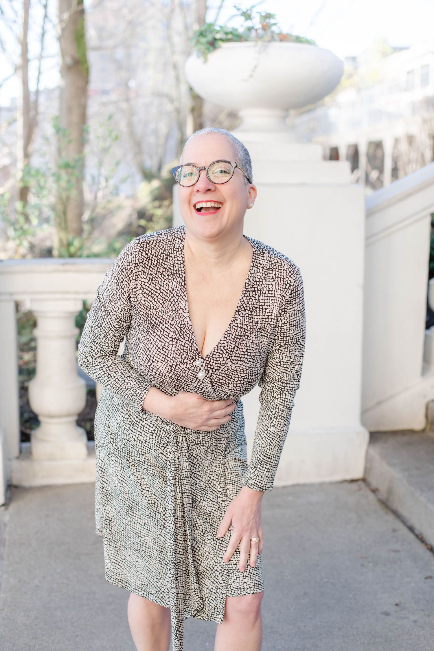 Candid portrait series showing joyful expressions in leopard print dress.
