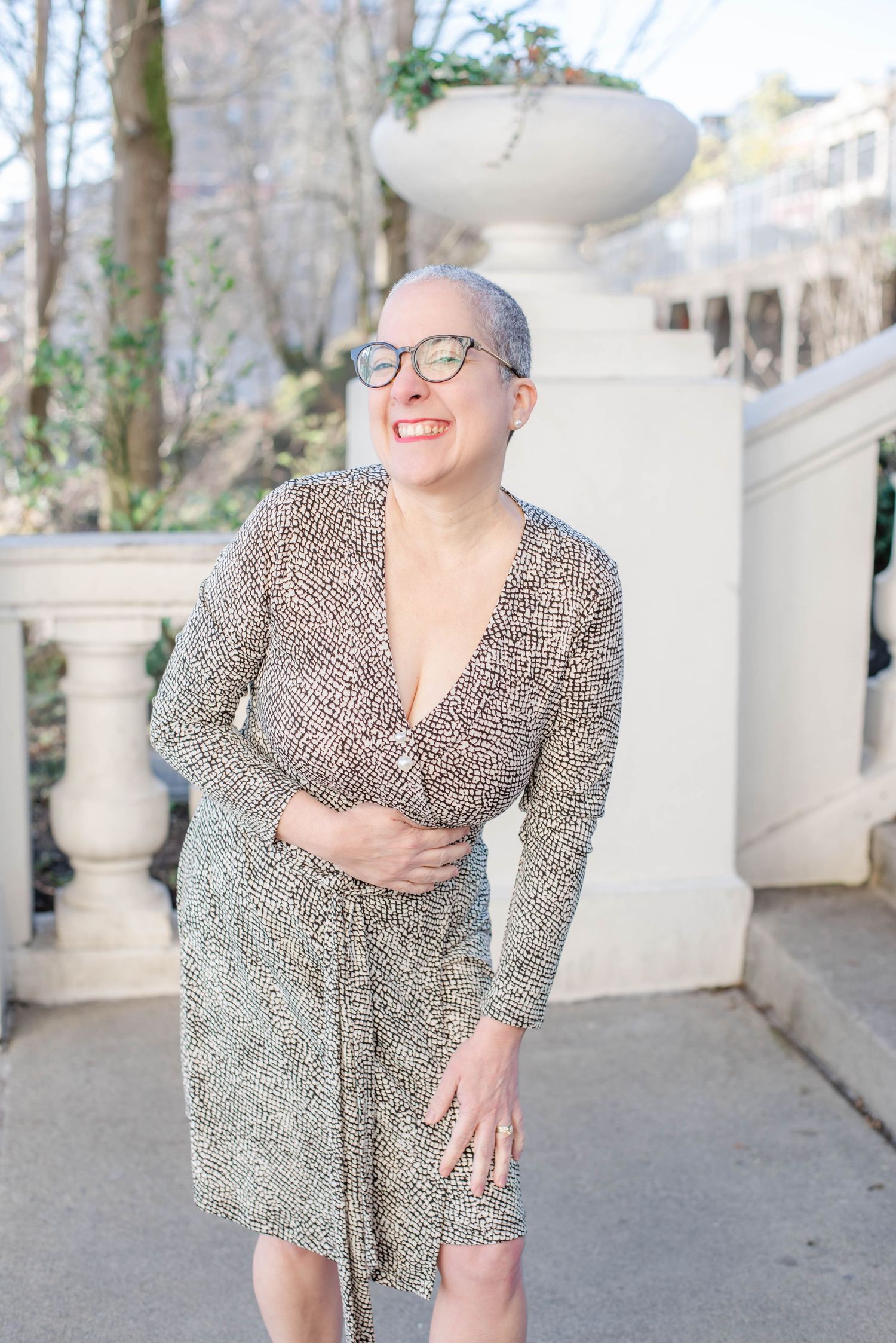 Candid portrait series showing joyful expressions in leopard print dress.