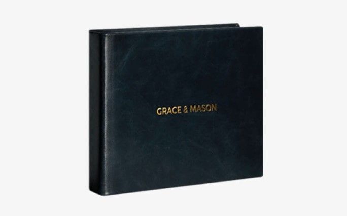 Luxurious genuine leather cover with a soft finish, enhancing the elegance of the photo album
