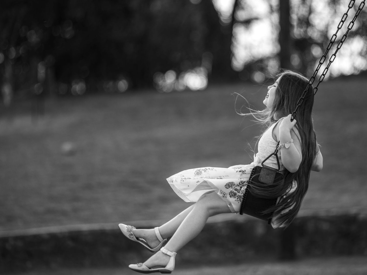 Family photos girl swinging
