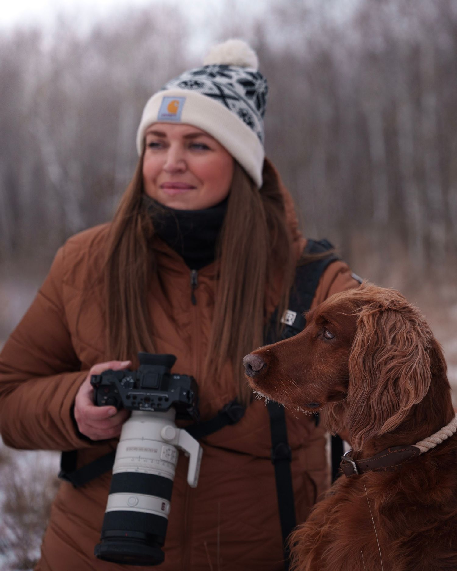 Side profile portrait at sunset showing long brown hair and peaceful expression.