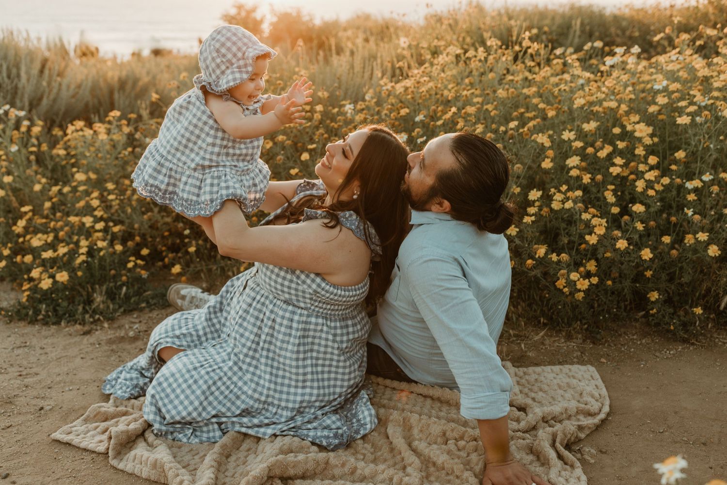 family portrait session amongst the spring flowers at sunset cliffs