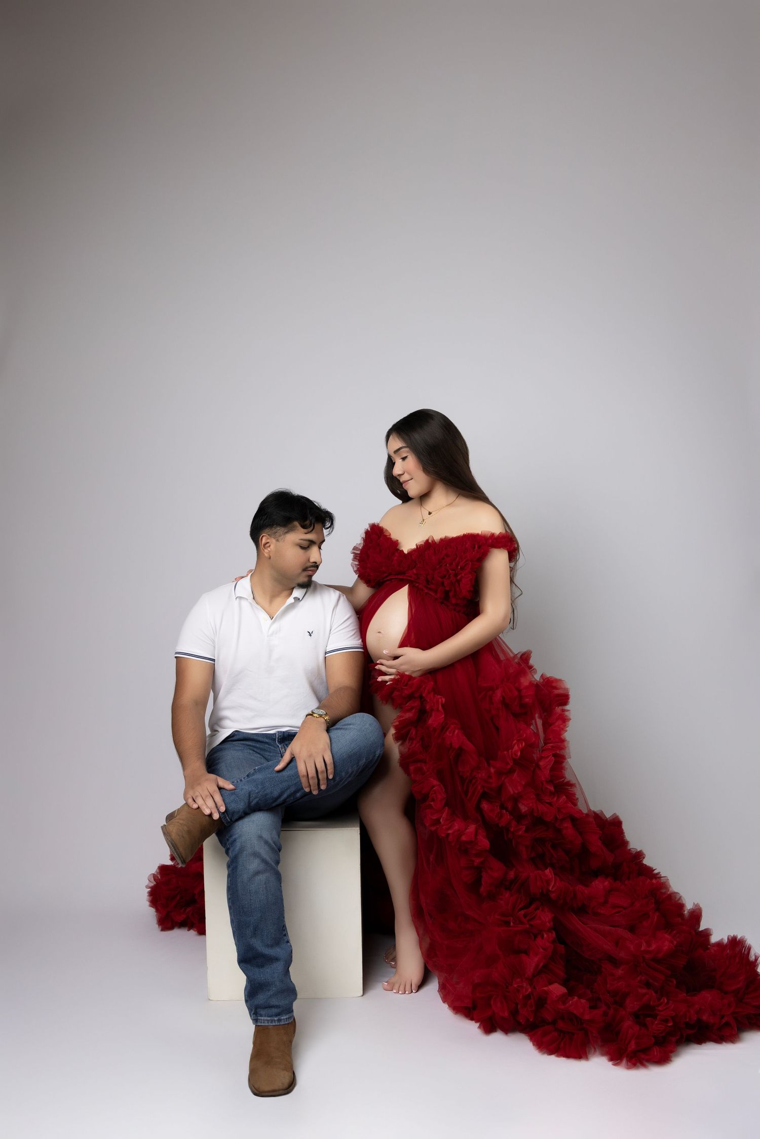 Series of pregnancy announcement photos with ultrasound images against white background.