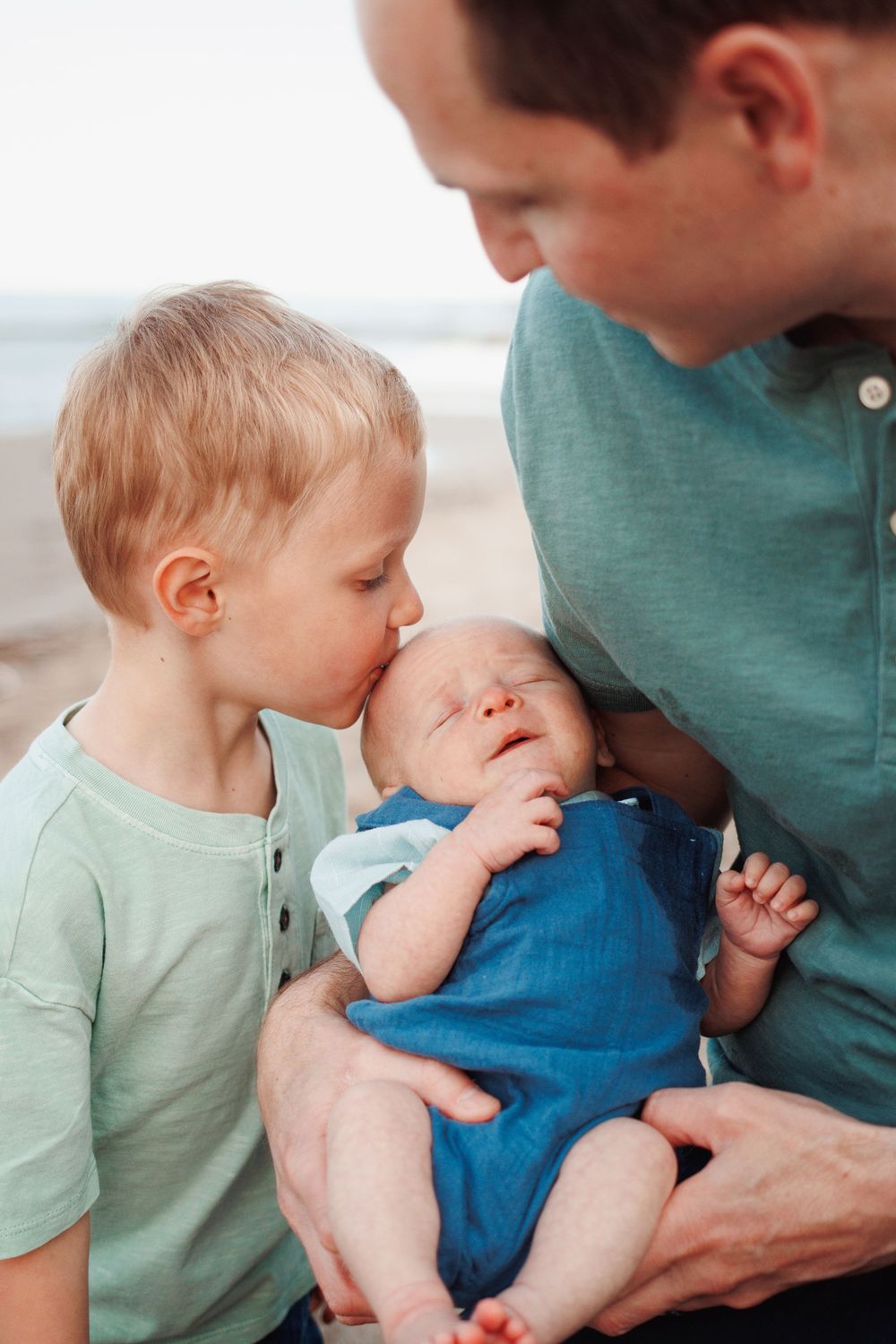 Family photographer documenting genuine family moments