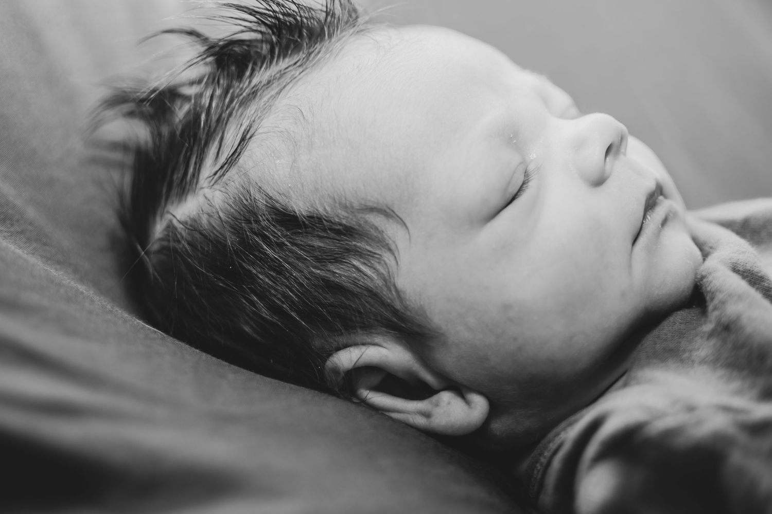 Black and white close-up of a newborn session in Tri Cities, Washington studio.