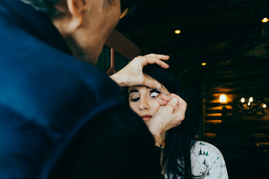 Bride in Lake Placid undergoing bridal make up.