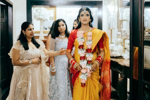 Indian bride in Houston makes her entry for the Pheras.