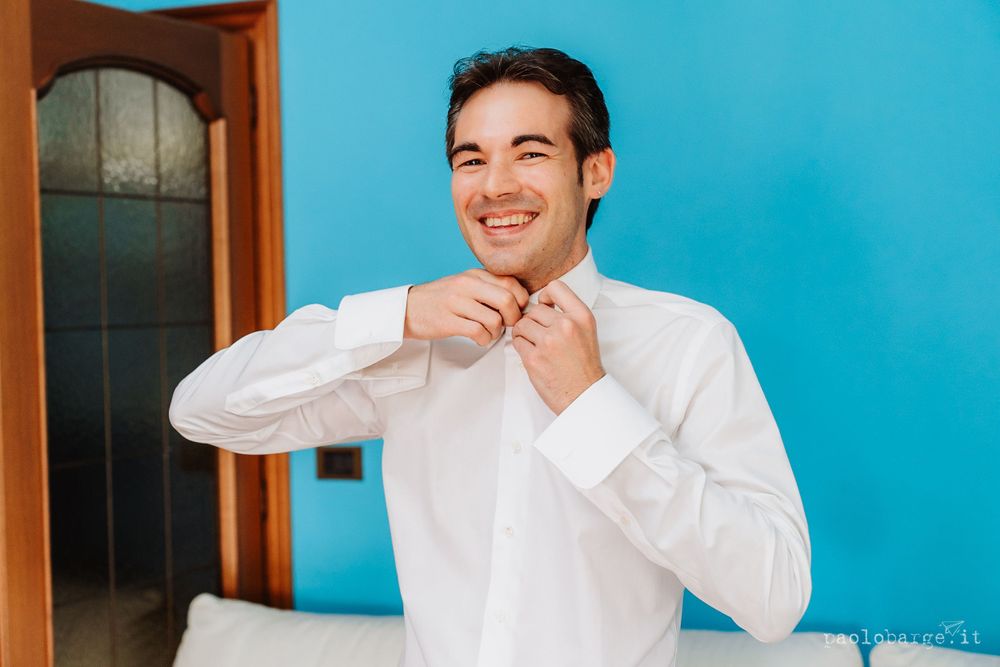 Getting ready scene against bright blue wall background.