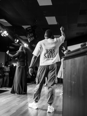 Black and white photos of worship dancers in flowing outfits practicing in a studio.