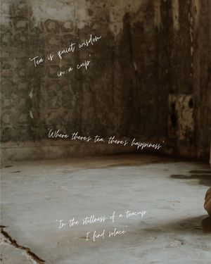 Graffiti-style text written on a grungy concrete wall and floor with moody artistic lighting.