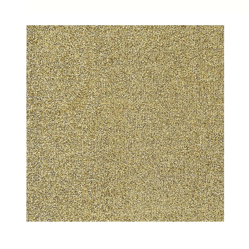Metallic gold glitter textured background surface.