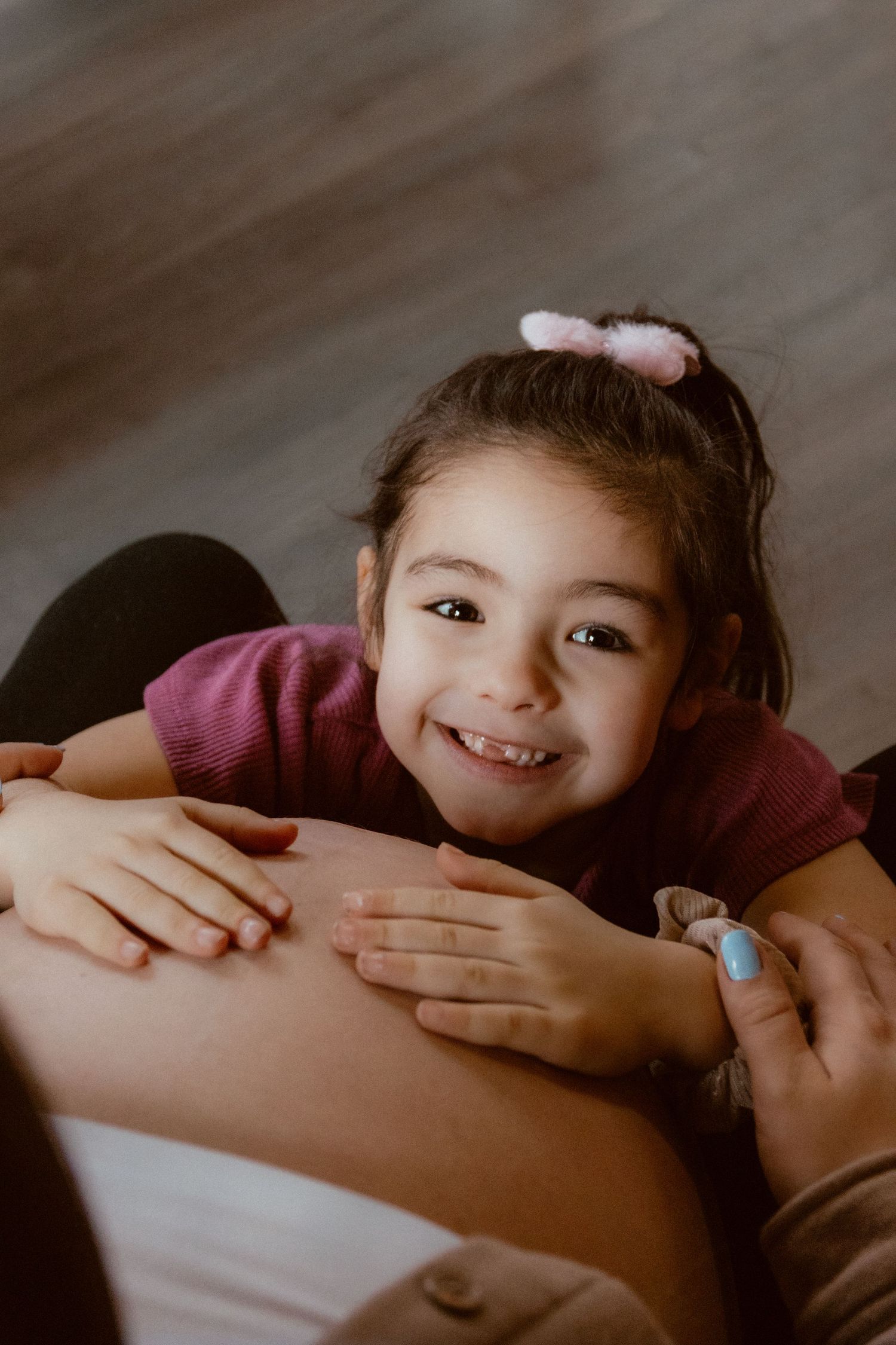 A close-up portrait showing a loving smile and joyful expression.