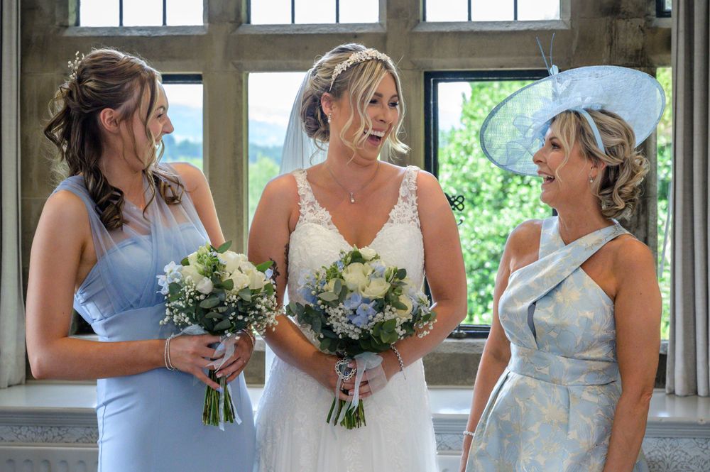 Bridal party enjoying moment before wedding ceremony at Cragwood Country House