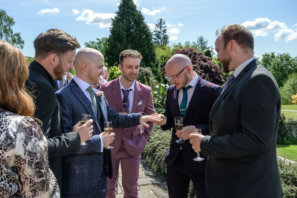 Groom showing ring to guests at Cragwood Country House wedding