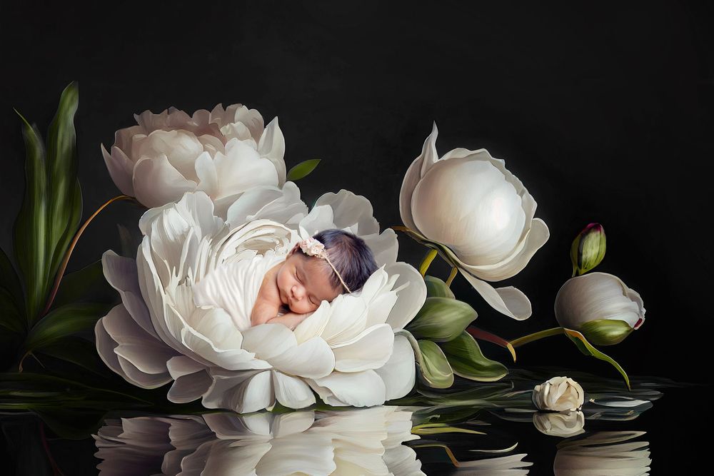 stunning baby girl in sleeping in a flowers scene