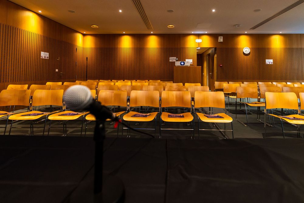 Conference room set up for Windfall Trust AI workshop, Collège de France, Paris - parisianphotographers.com