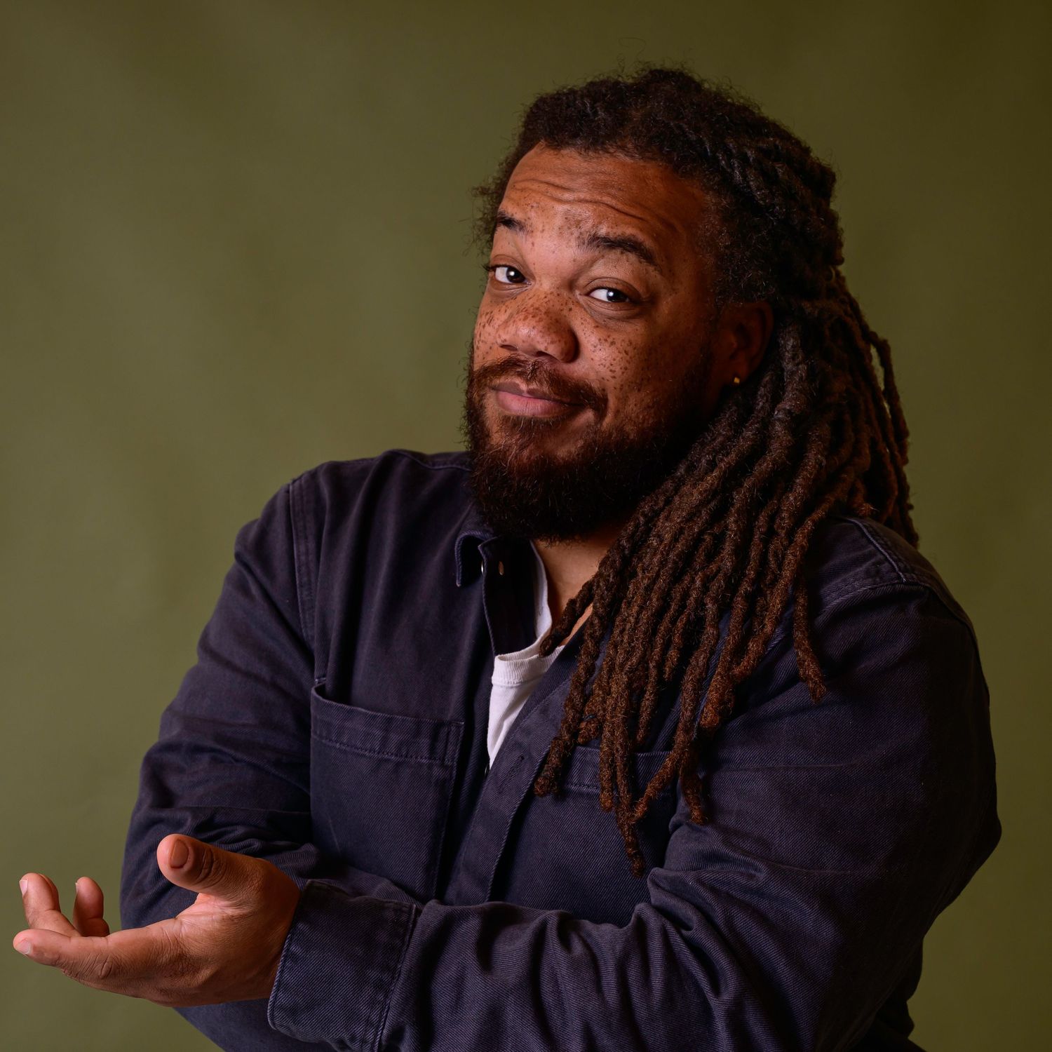 Personal branding portrait of a male professional in a relaxed studio setting