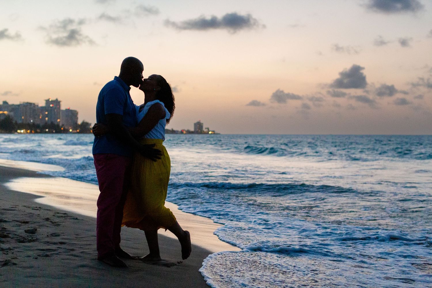 Couples portrait. Silhouette on the beach in Isla Verde, Carolina, Puerto Rico.