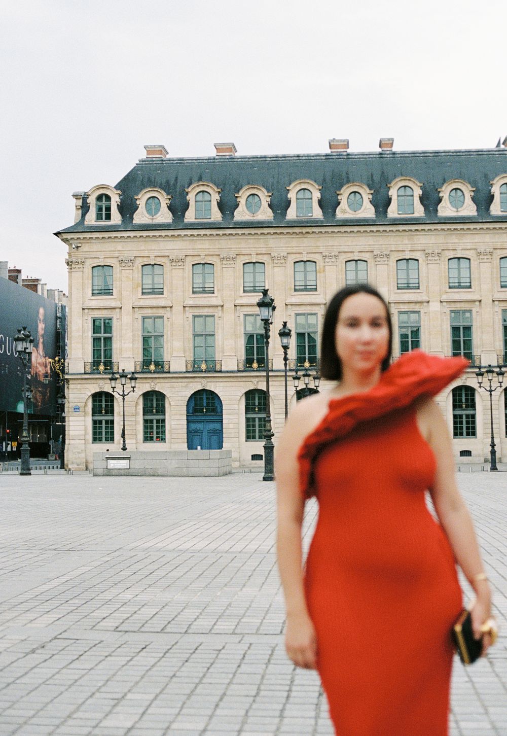 Place Vendôme, Paris, France. Schiaparelli red dress, Schiaparelli fashion. best paris fashion photographer, film fashion photography