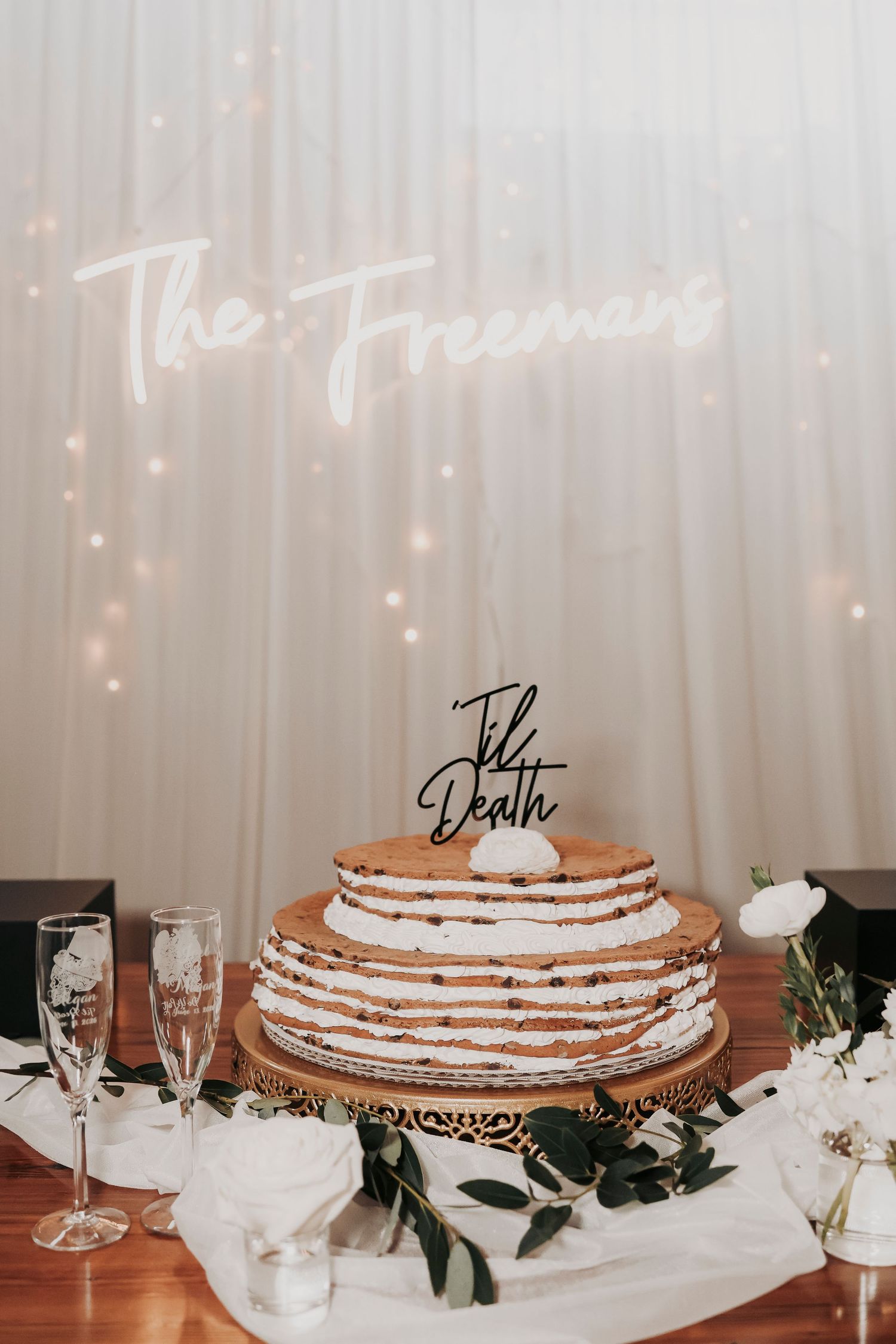 Wedding cake displayed inside The Cotton Mill reception space