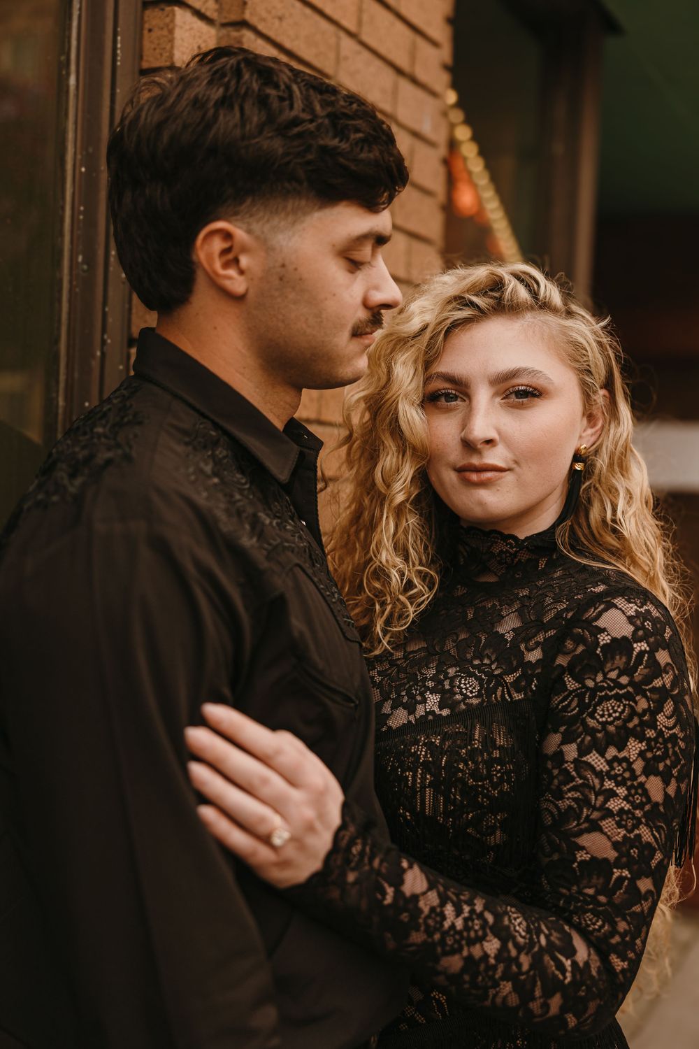 Couple poses in Livingston, Montana for their welcome party - Livingston Wedding Photographer captures Wedding Weekend in paradise Valley