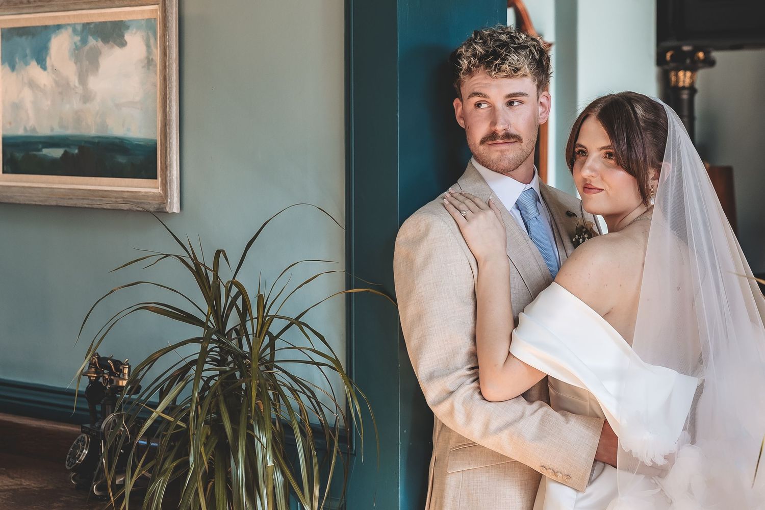 Bride and Groom with a simple casual pose for wedding photos at Charlotte House.