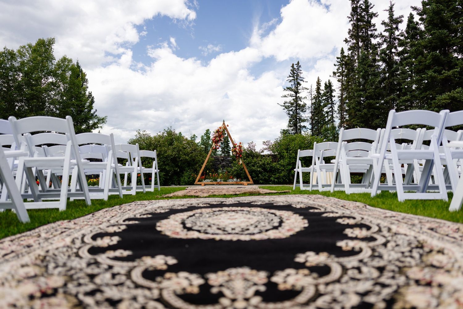 Outdoor wedding ceremony setup on the lawn at Azuridge