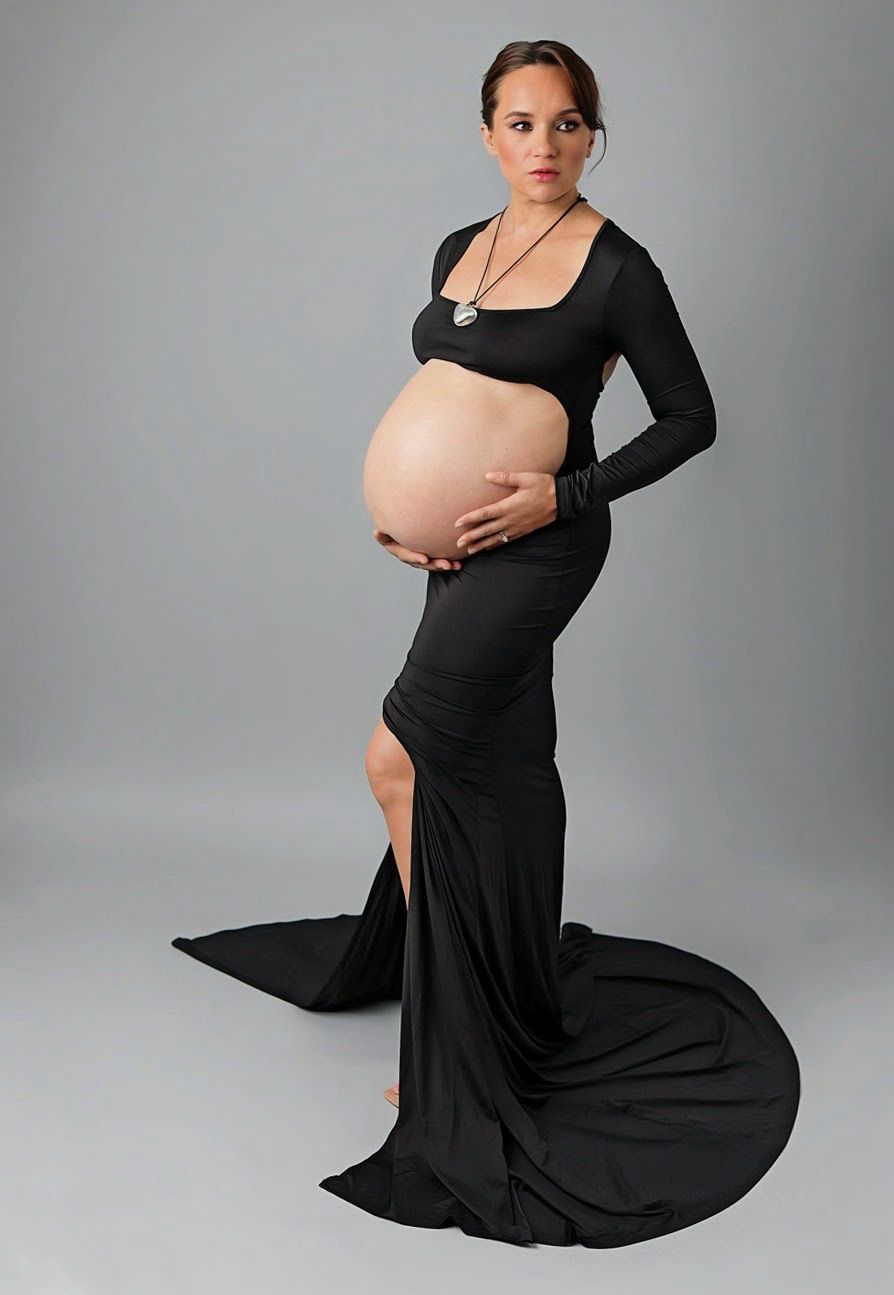 Expecting mother in a black gown during a studio maternity photography session in Ventura County.
