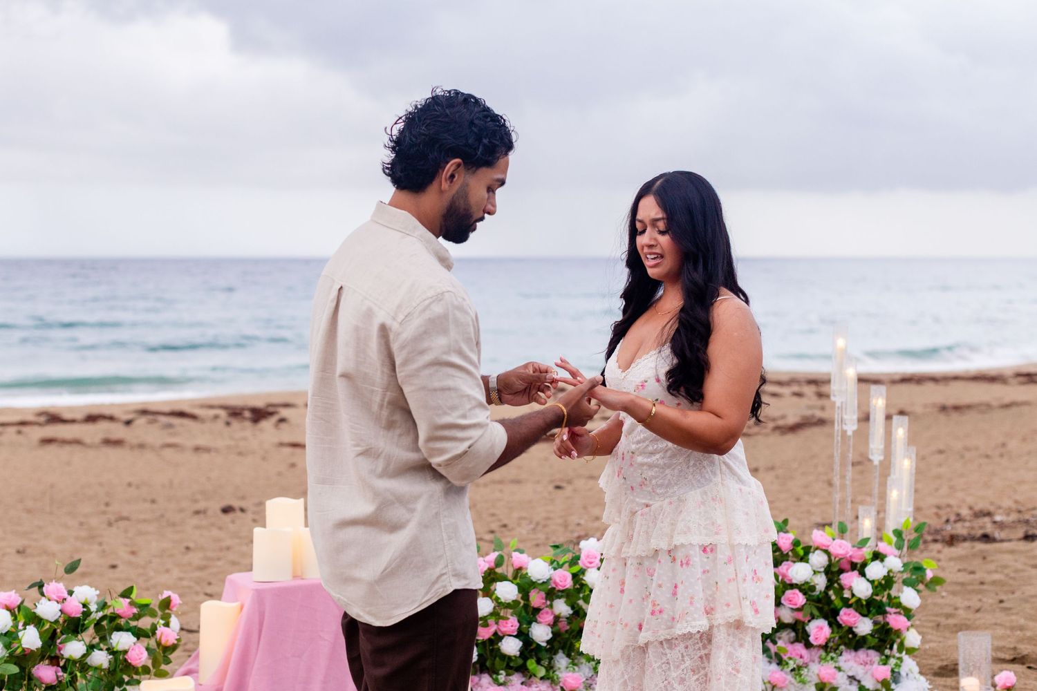Marriage proposal on the beach with flowers and candles. Playa Guajataca, Isabela, Puerto Rico.