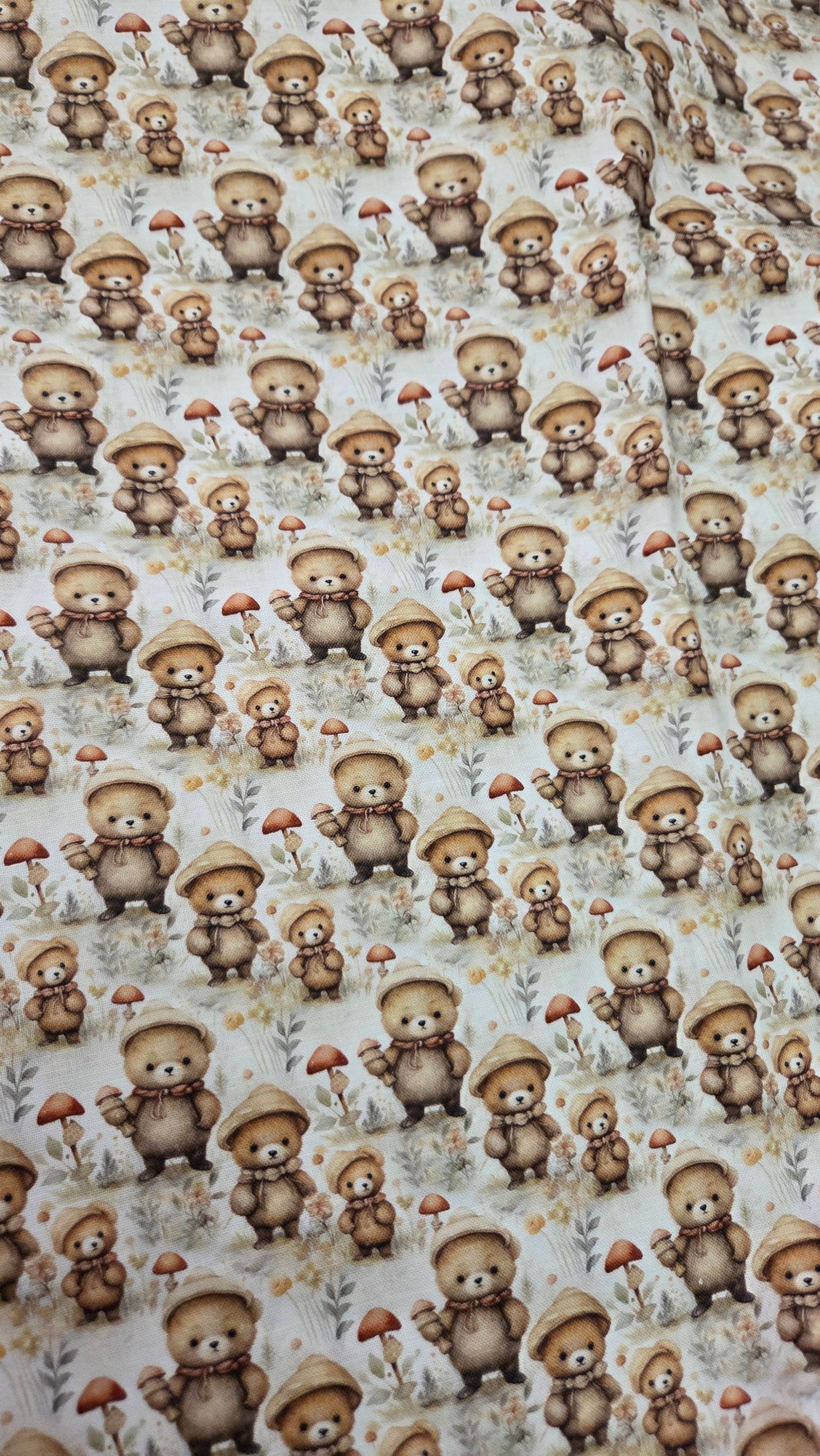 Cute teddy bear fabric pattern featuring bears in hats with mushrooms and flowers in warm neutral tones.