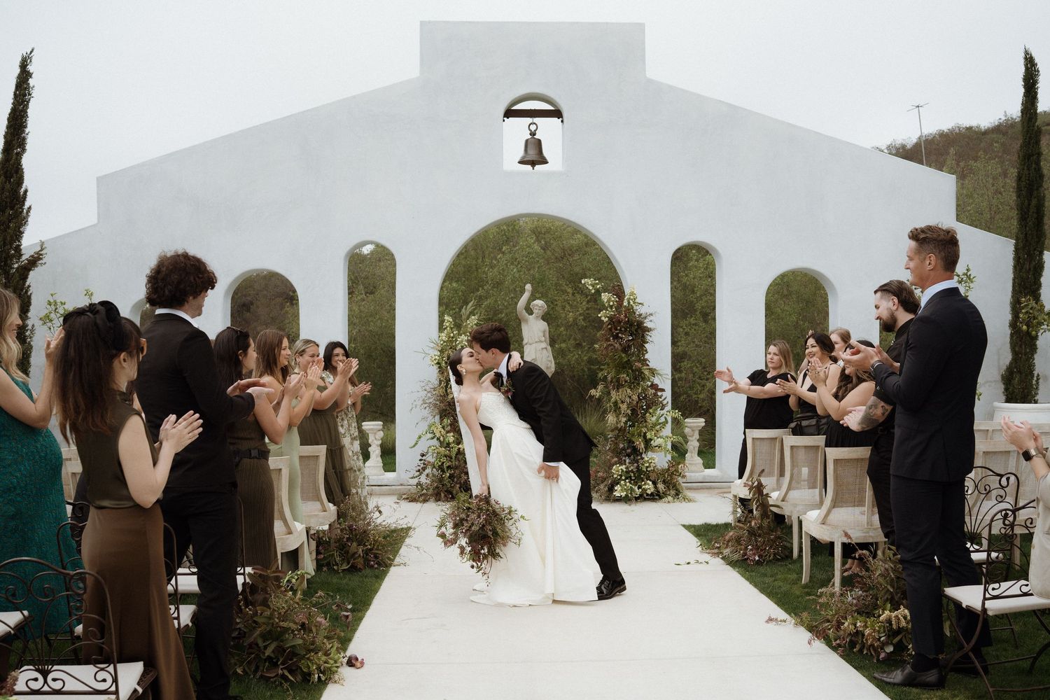 Golden hour glow and heartfelt vows at Jeune Perché’s stunning cliffside venue.