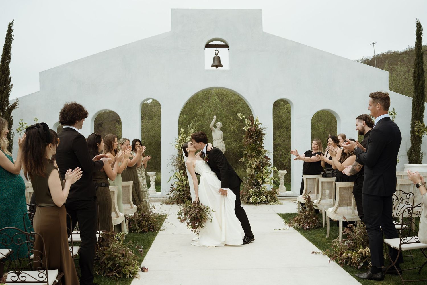 Golden hour glow and heartfelt vows at Jeune Perché’s stunning cliffside venue.