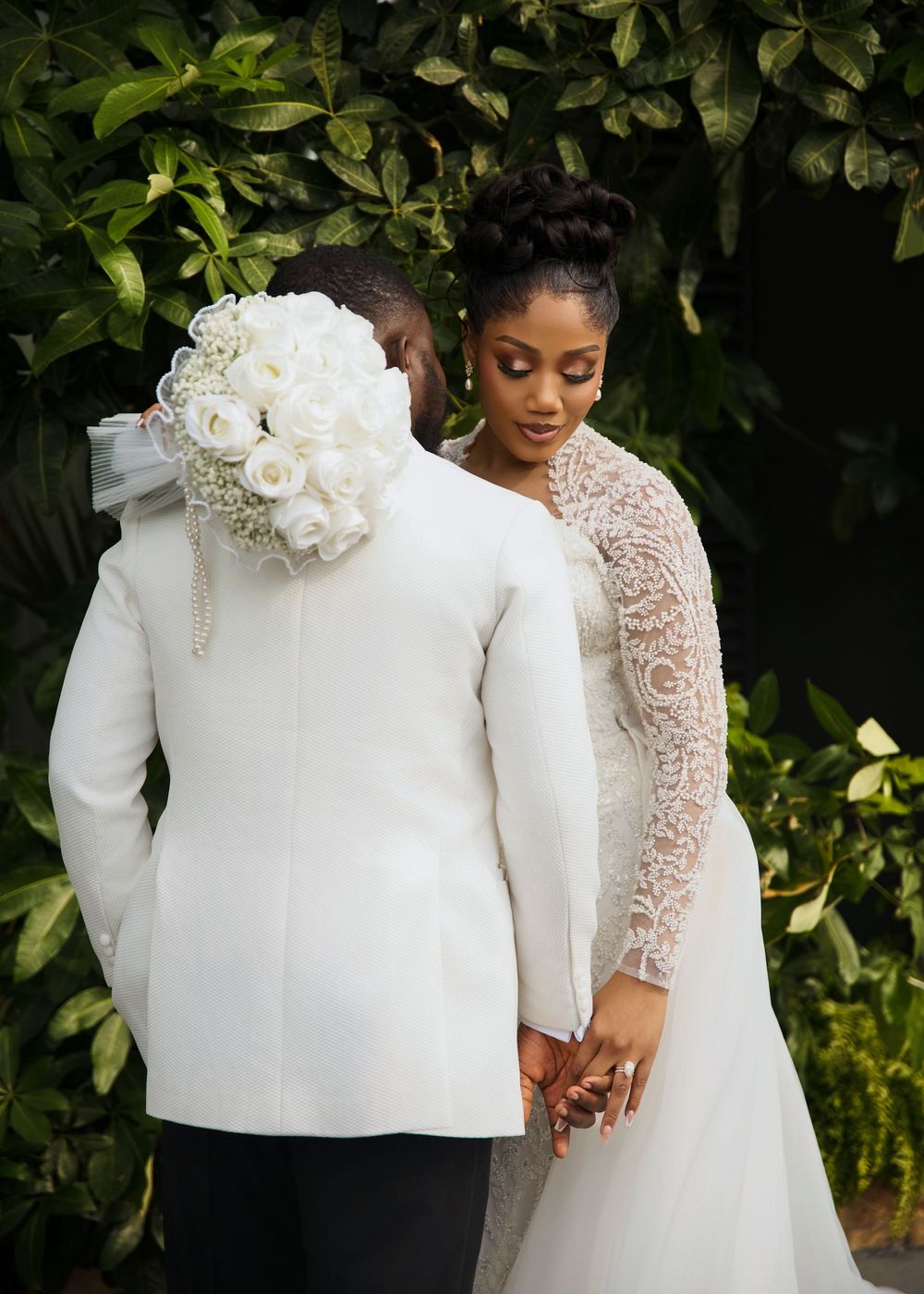 Romantic wedding portrait captured by Roy Ayomide Studios with timeless storytelling and elegant composition.