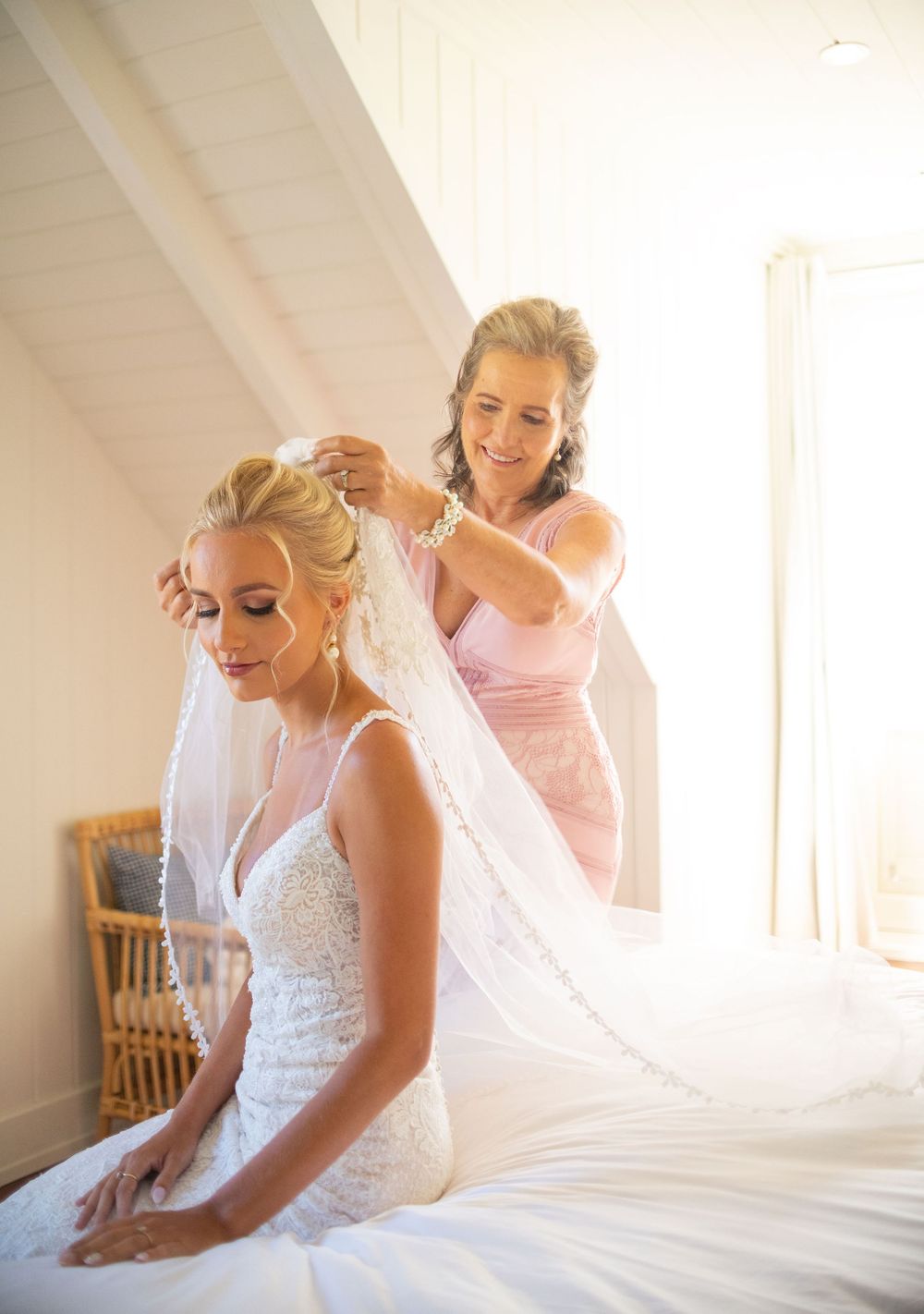 Series showing preparations with white wedding dress and veil in a bright sunlit room.