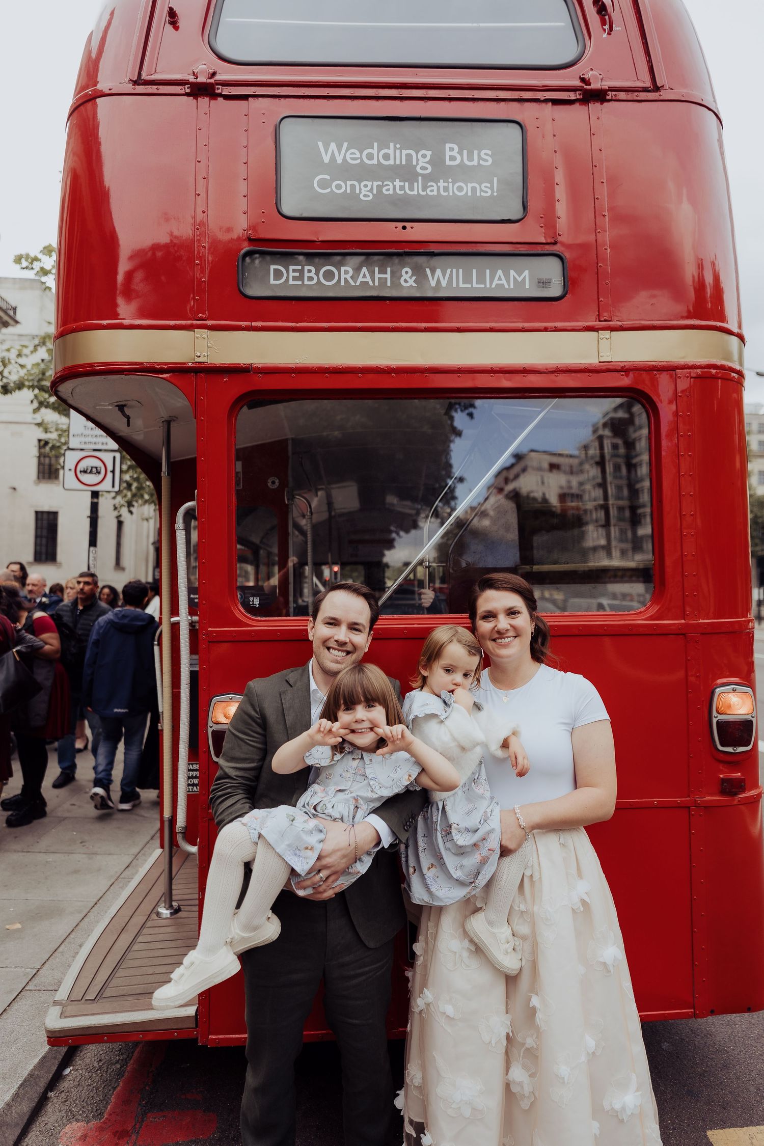 A collection of photos showing a vintage red London double-decker bus being used as a wedding bus for celebrations.