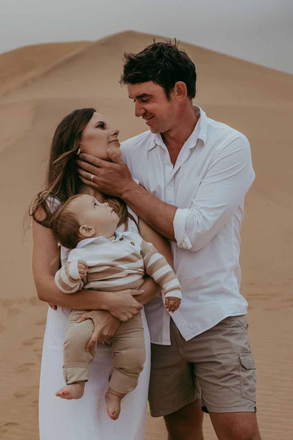 A happy family enjoying a day at the dunes in Swakopmund