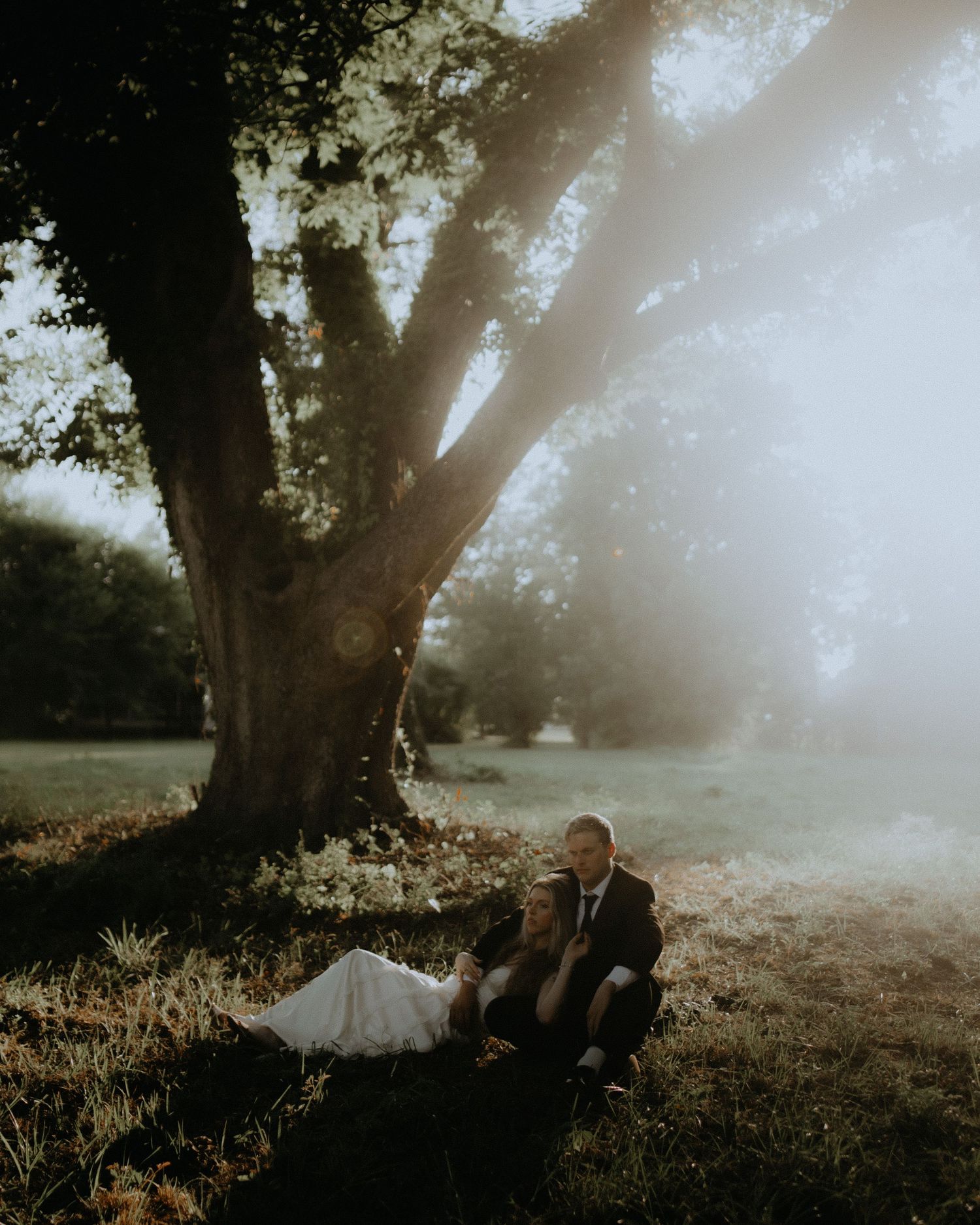 Moody Golden Hour Bride and Groom photos in field in North Carolina