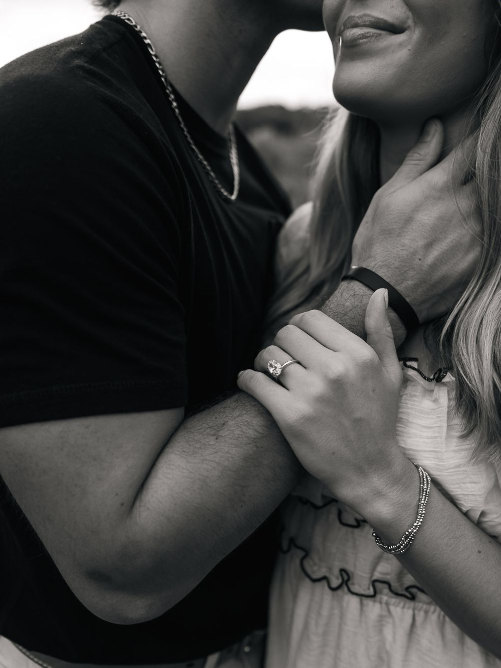 Intimate black and white close-up photos of a couple embracing.