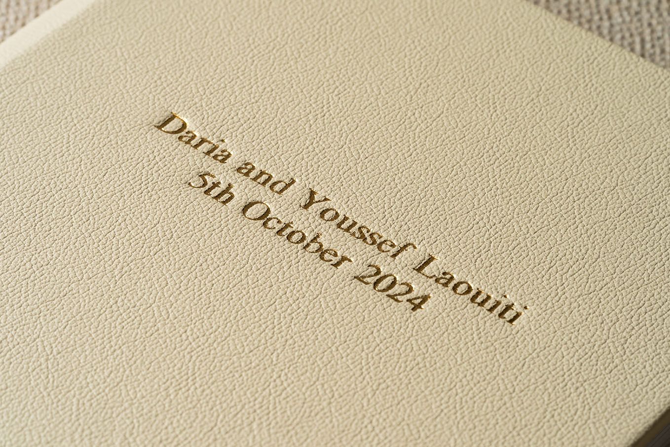 A close-up view of text printed in an italicized serif font on beige paper with slight blur and texture visible.