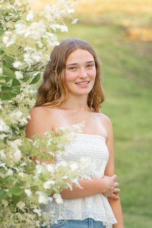 White floral portrait in a summer garden with soft natural lighting and a dreamy ethereal mood.