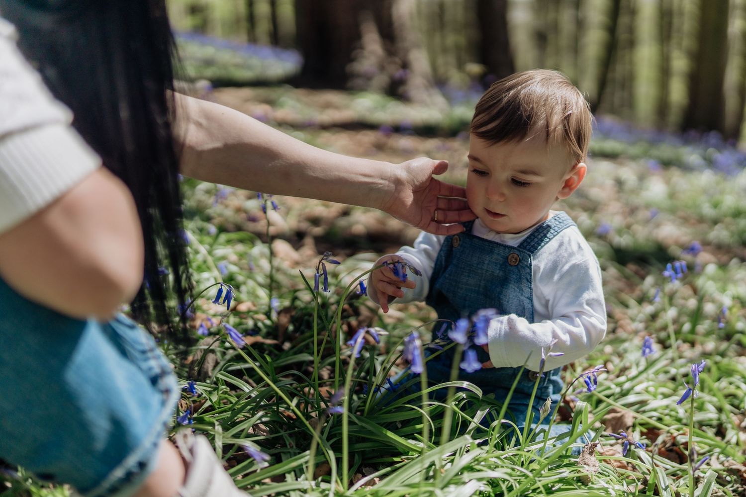 baby with bluebells