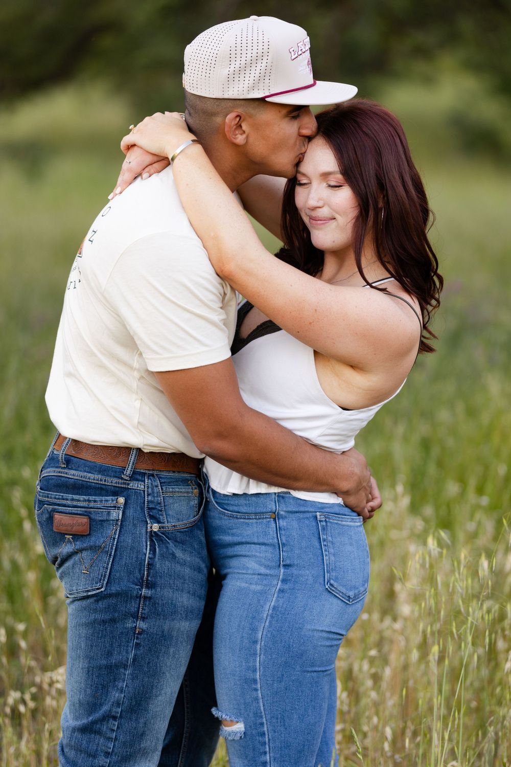 Engagement session in upper park, bidwell park, Chico, California with green grass in the background