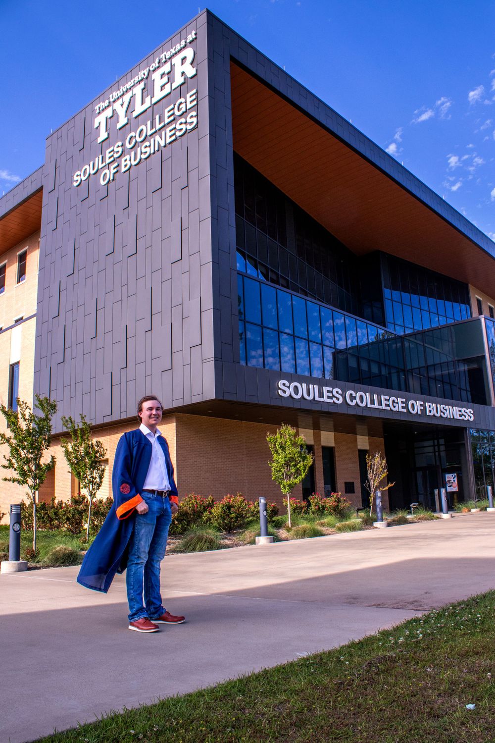 Modern college building with angular architecture and glass panels under blue sky at Soules College of Engineering.