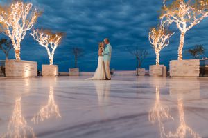Destination wedding ceremony setup overlooking the sea